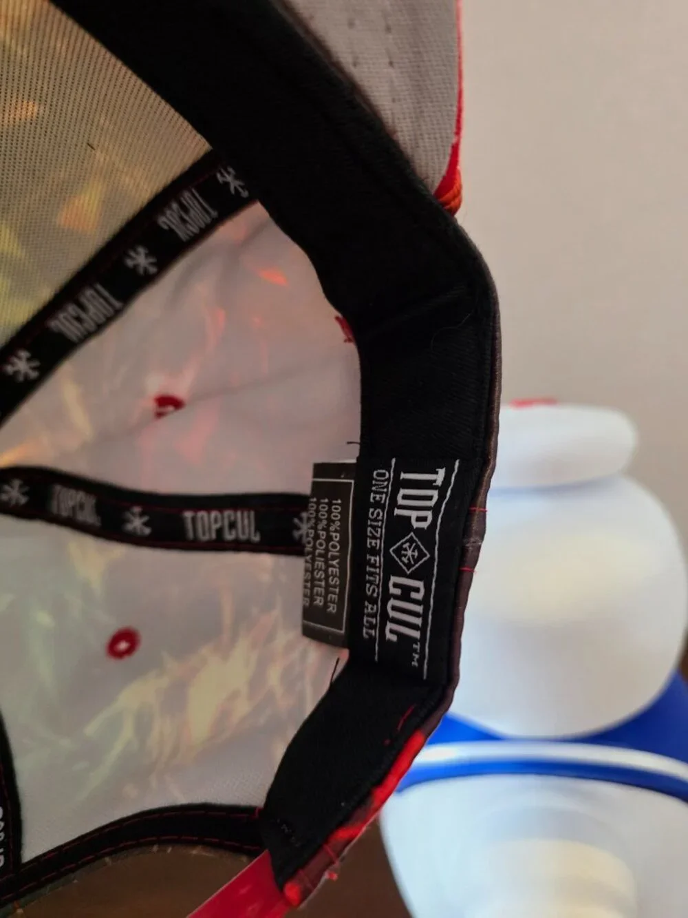 Top Cul snapback hat features a vibrant, multi-colored light